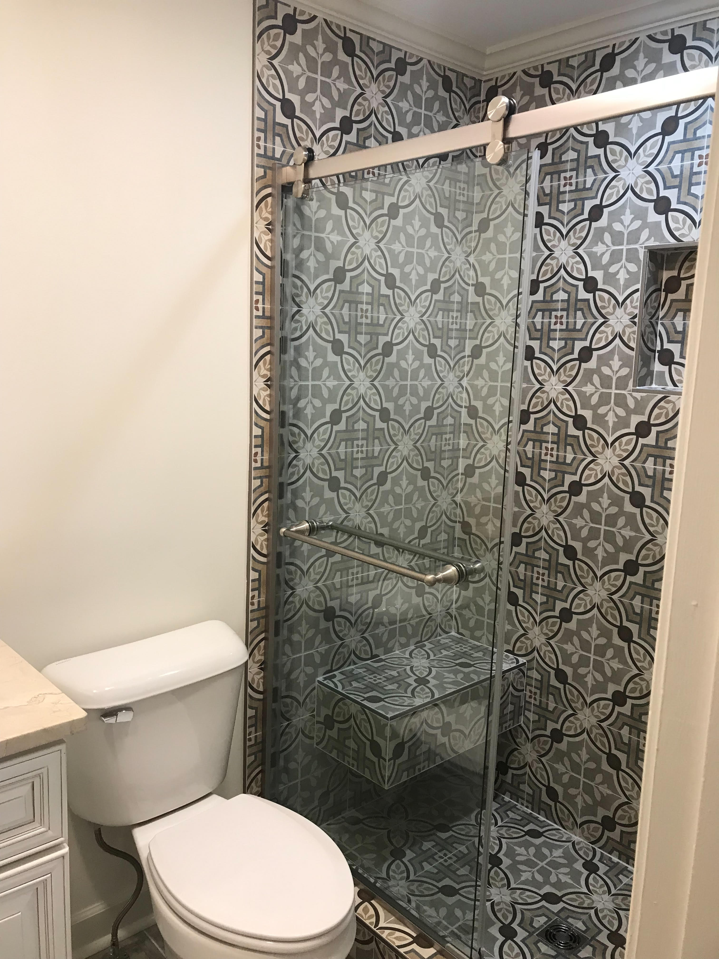 Bathroom with Decorative Pattern Tile Shower