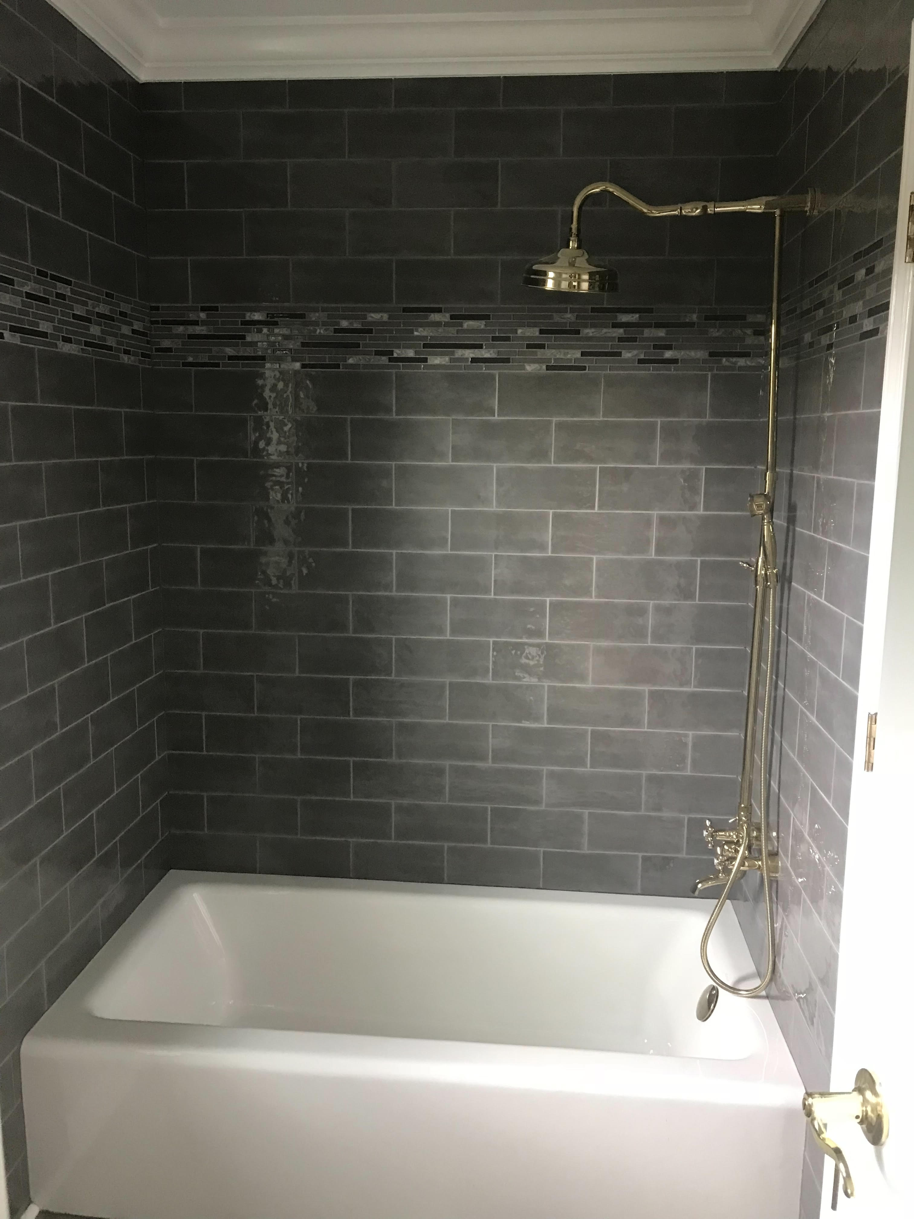 Bathroom with Gray Tile Tub Surround