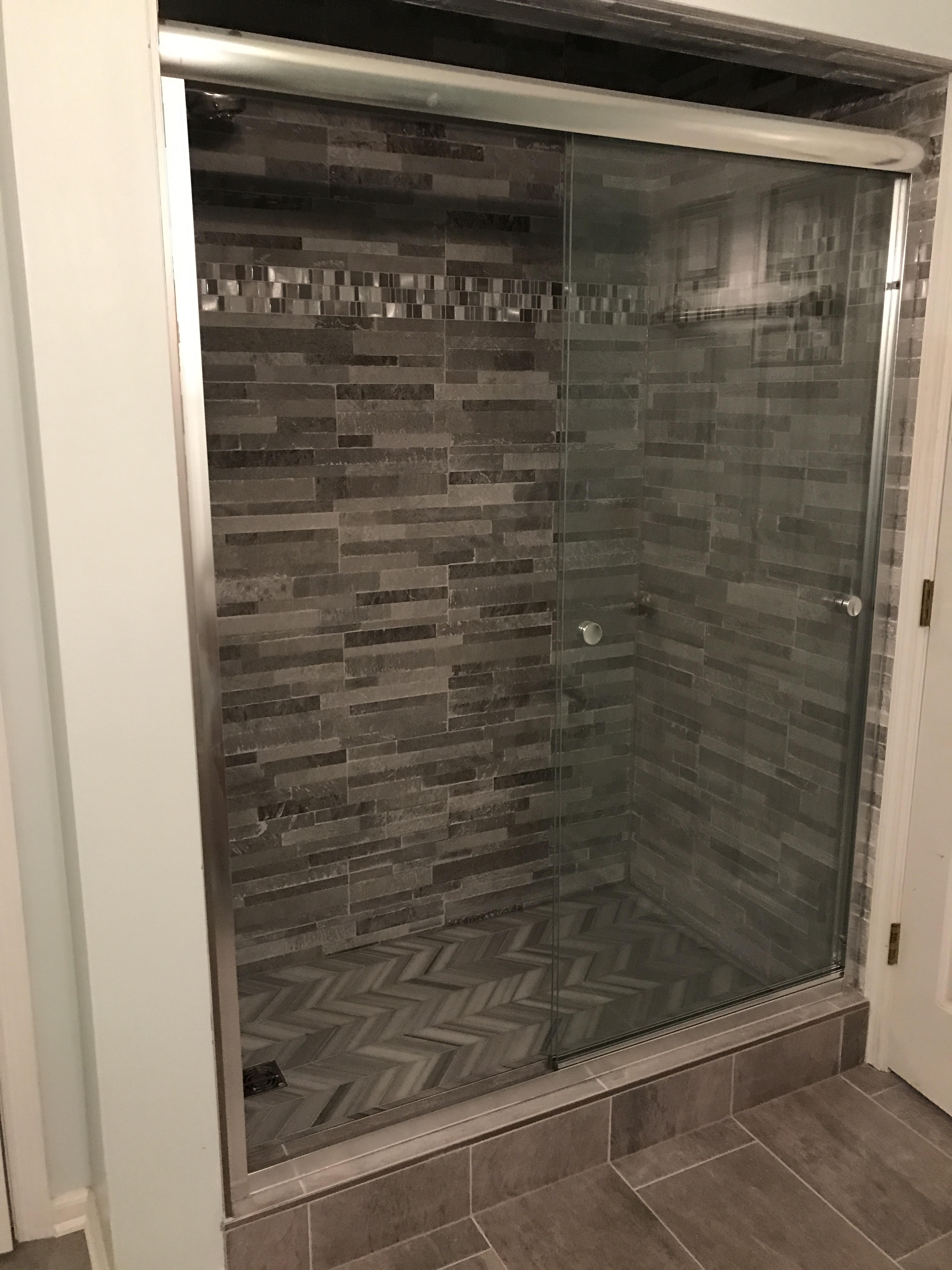 Modern Walk-In Shower with Herringbone Floor